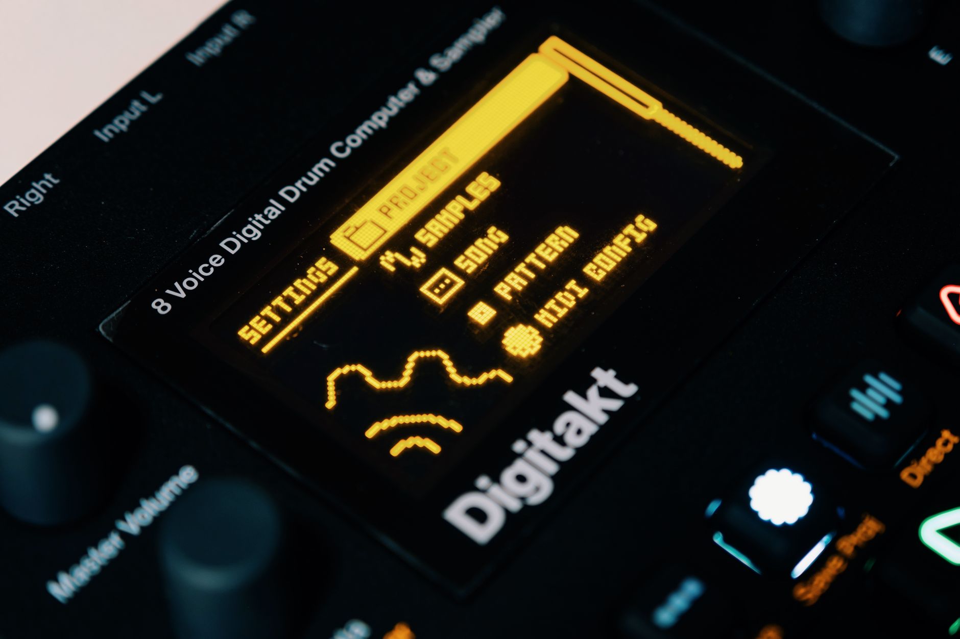 Detailed view of a digital drum computer's illuminated interface showing settings and samples.