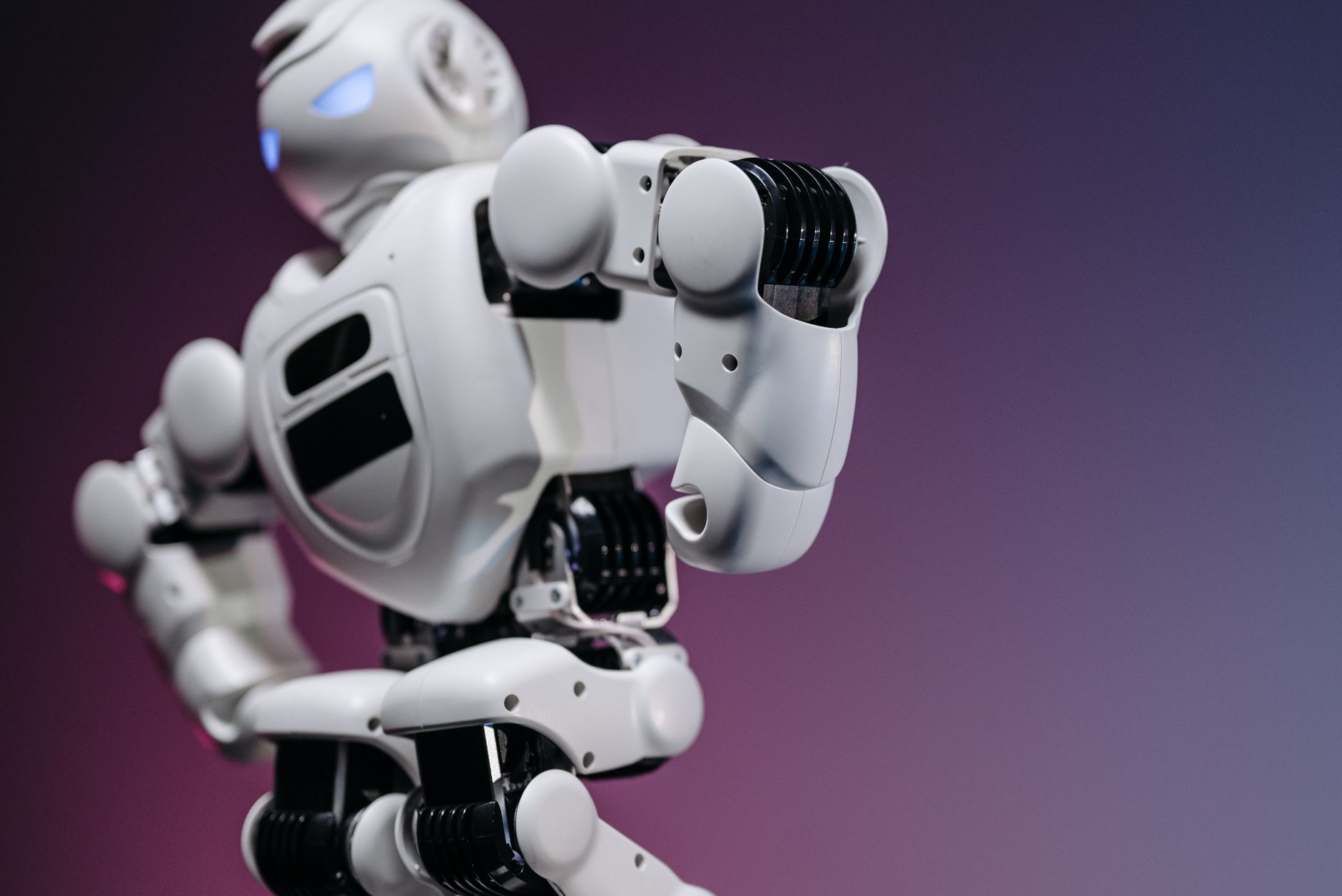Close-up of a futuristic white robot showcasing innovation and design.