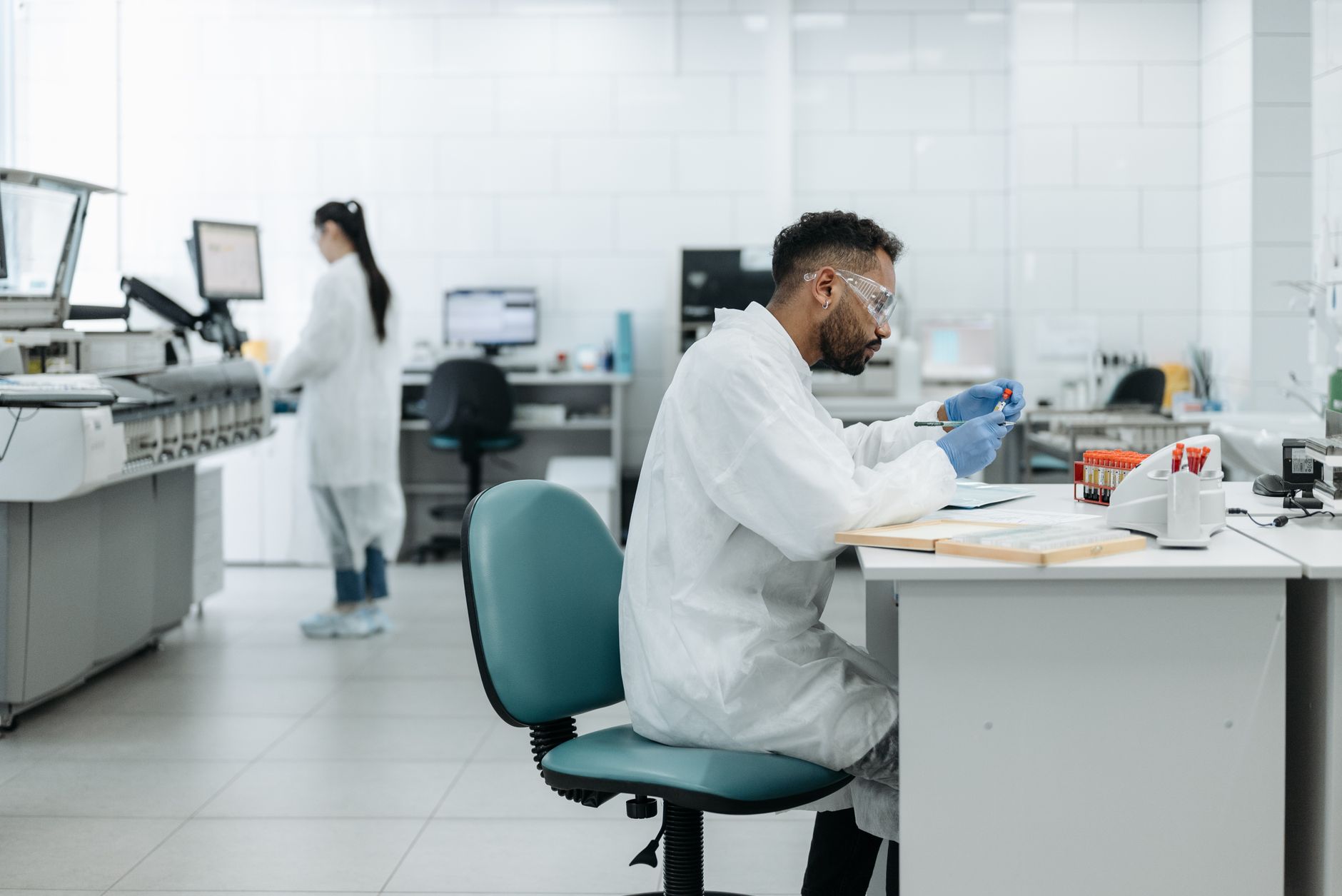 Researchers analyzing samples in a modern laboratory equipped with advanced technology.